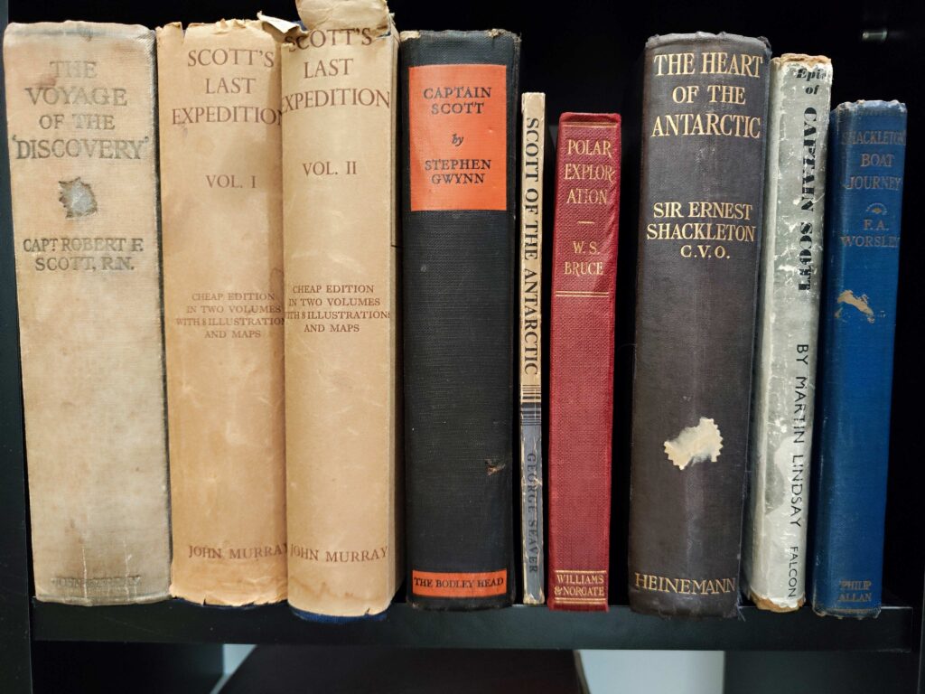 The collection of Antarctic exploration books owned by Tadhg Gahan, including works by Scott, Shackleton and Evans, gifted to Tim Foley by his son