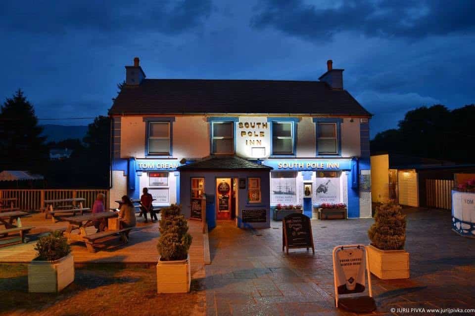 The South Pole Inn at night, photographed by Jurij Pivka — the pub remains the hub of pilgrimage for Tom Crean fans worldwide